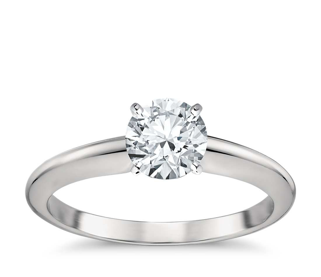 Solitaire Diamond Rings
 Classic Four Prong Solitaire Engagement Ring in Platinum