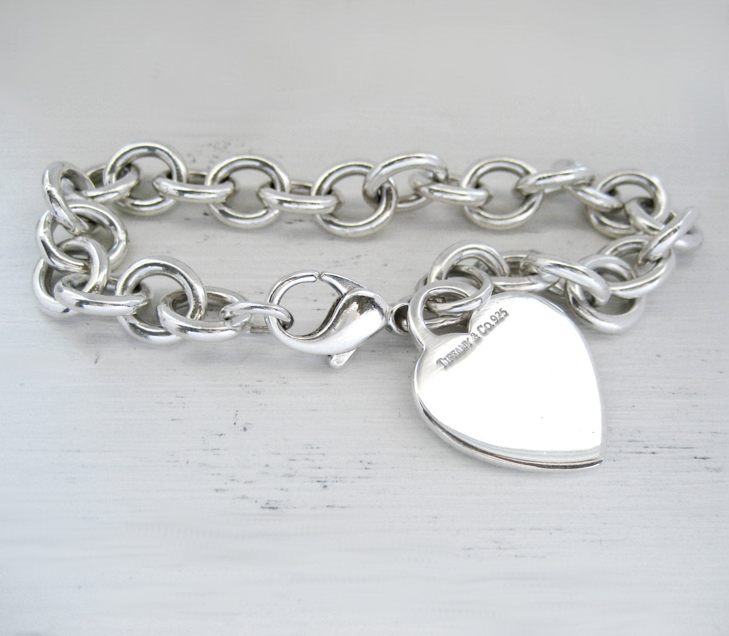 Tiffany And Co Heart Bracelet
 Tiffany & Co Heart Charm Bracelet 925 Sterling Silver Perfect