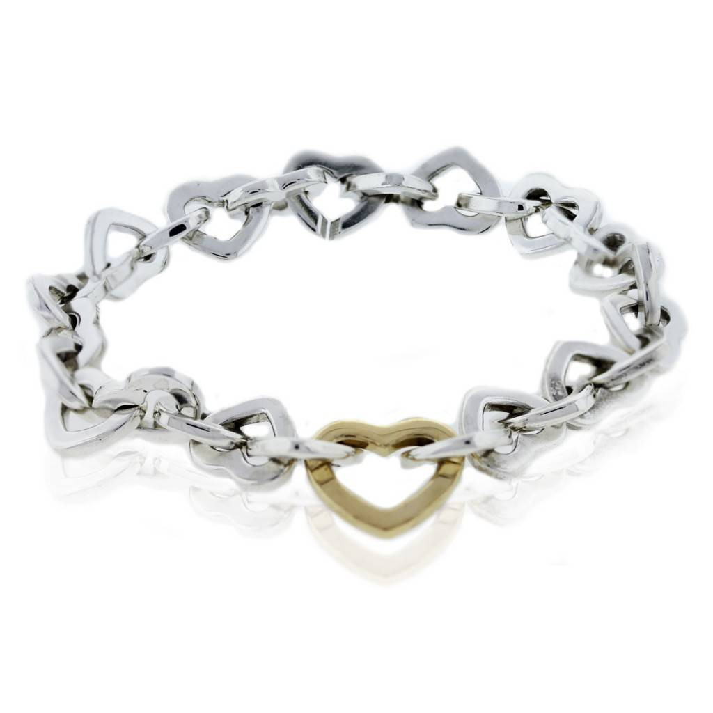 Tiffany And Co Heart Bracelet
 Tiffany and Co Sterling Silver 18k Yellow Gold Heart Link