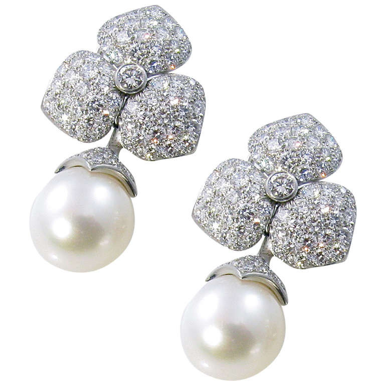Tiffany Pearl Earrings
 TIFFANY Platinum Diamond and Pearl Drop Earrings at 1stdibs
