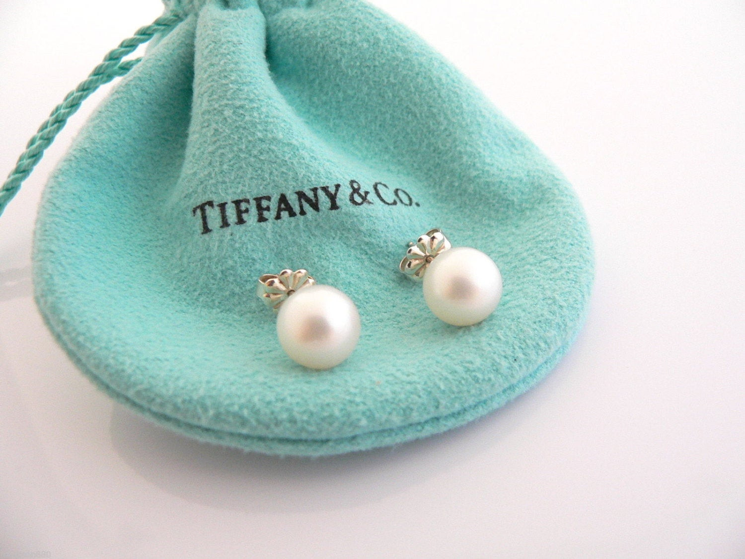Tiffany Pearl Earrings
 Tiffany & Co Sterling Silver Pearl Earrings Studs Classic