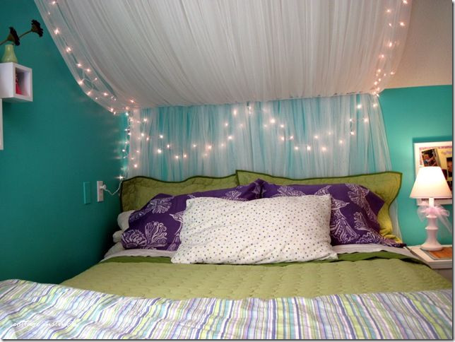 Twinkle Lights Bedroom
 The bed…canopy made from IKEA netted sheers and some white