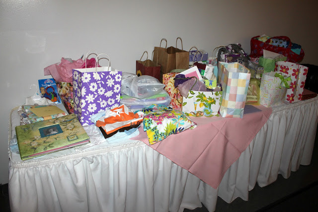 Unwrapped Gifts At Baby Shower
 Mountain Mama Surprise Baby Shower for 80 Year Old Woman