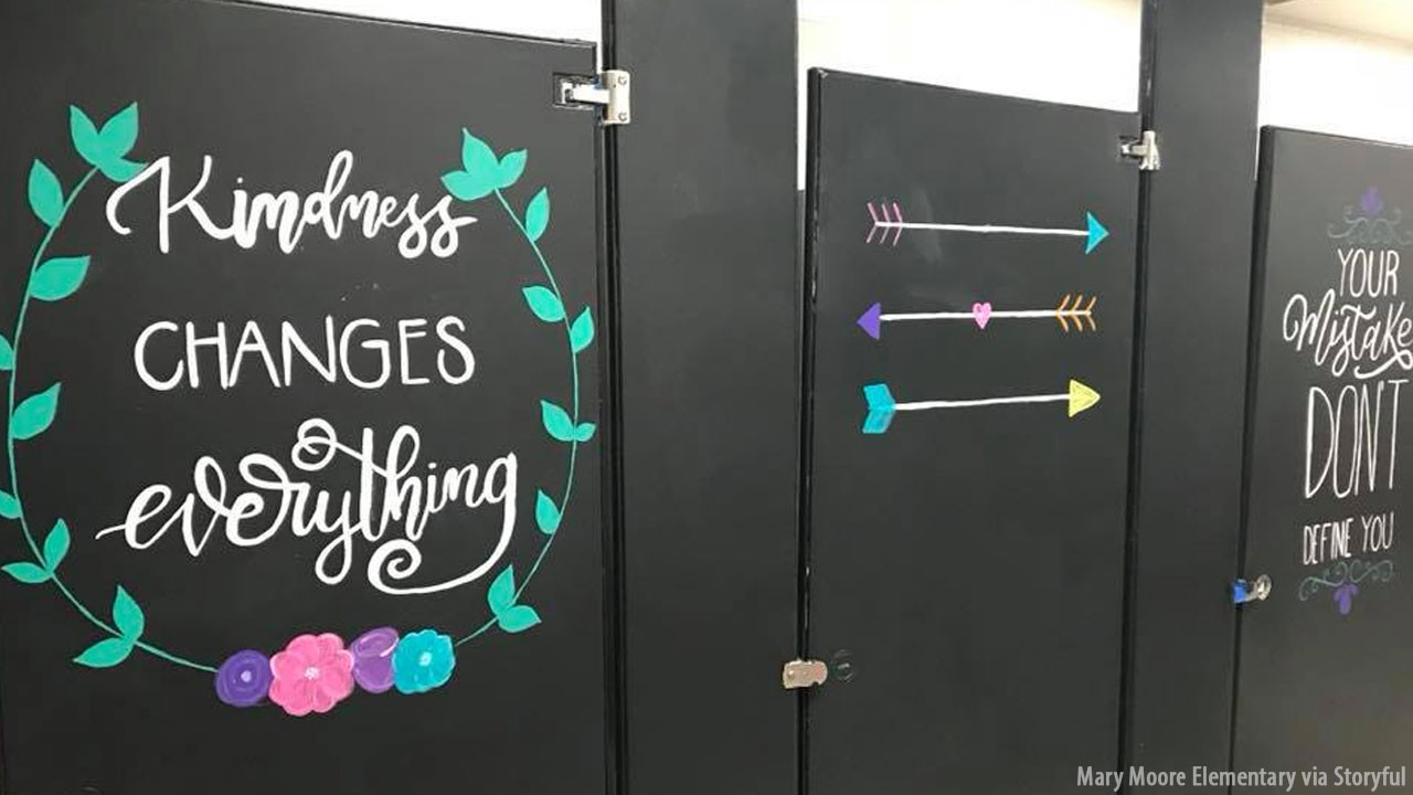 Uplifting Positive Quotes
 Elementary school parents paint uplifting messages on