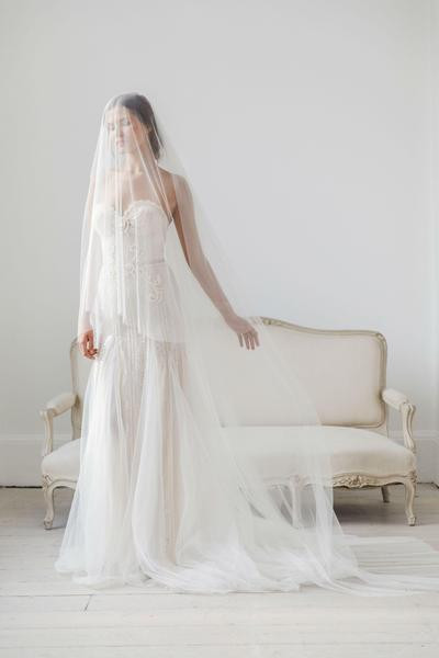 Veil In Wedding
 Cut edge silk style wedding veil with extra long blusher