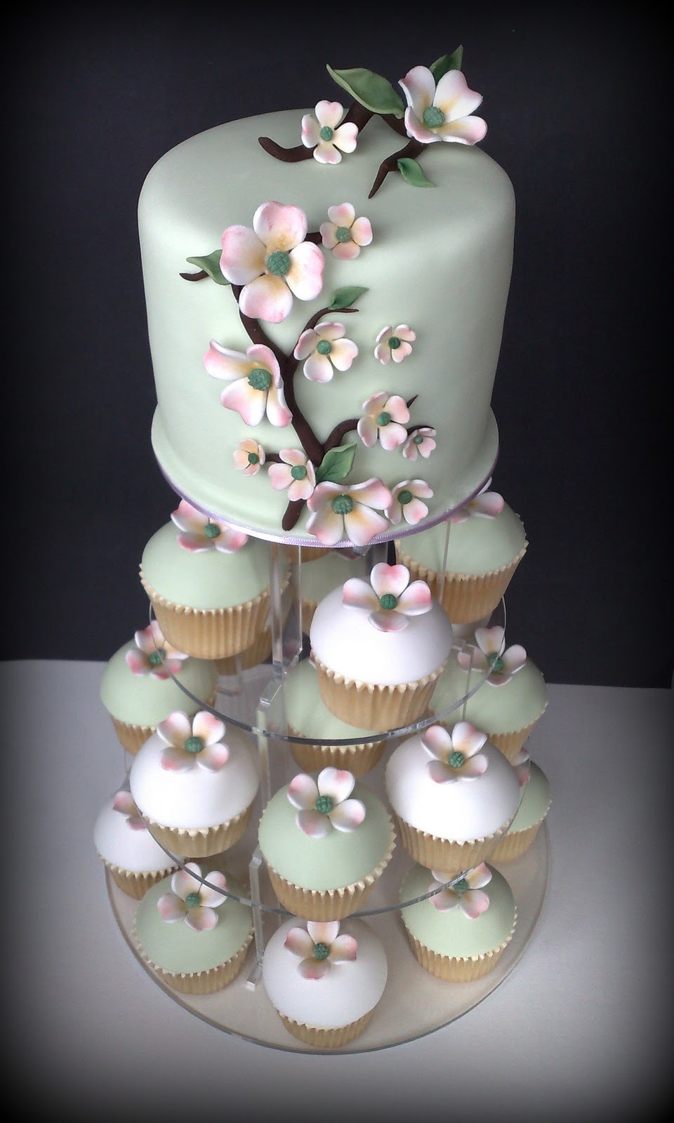 Wedding Cakes Cupcakes
 Small Things Iced Dogwood Wedding Cupcakes & Cutting Cake