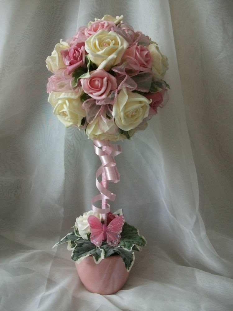 Wedding Flower Pictures
 beautiful pink & ivory rose topiary tree wedding flowers