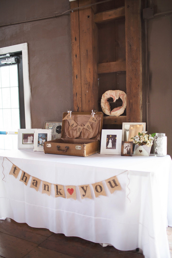 Wedding Gift Table
 A vintage suitcase and burlap bunting decorated the t