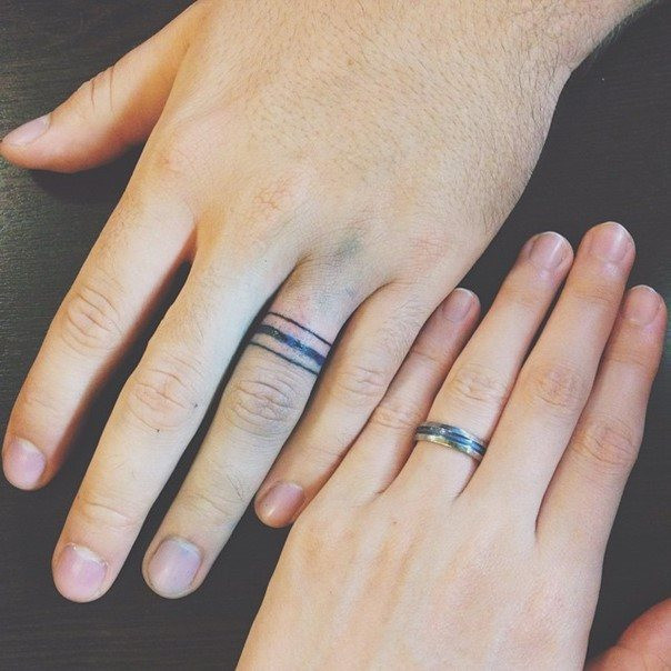 Wedding Ring Finger Tattoos
 50 Cool Wedding Ring Tattoos To Express Their Undying Love