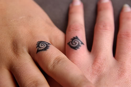 Wedding Ring Tattoo Designs
 graffiti bridge Tattoos Ring Finger