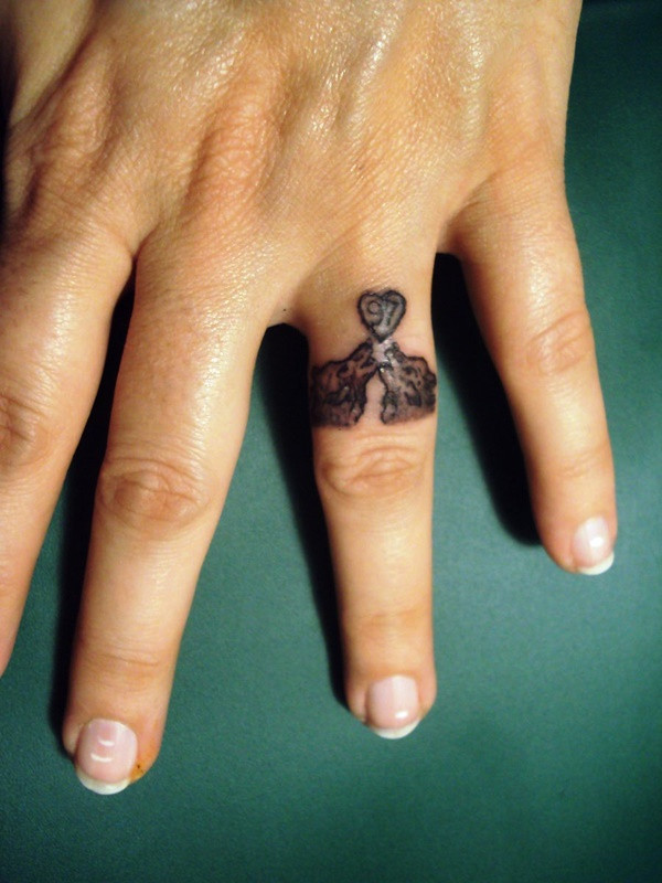 Wedding Ring Tattoo Designs
 76 of the Most Inventive Wedding Band Tattoo Designs