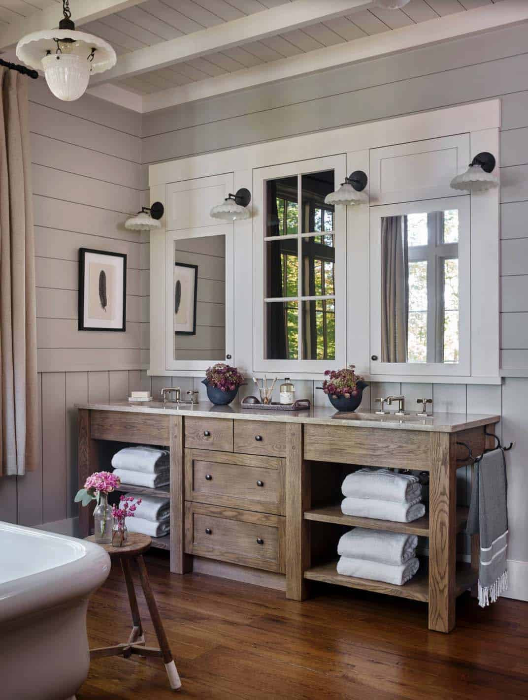 Lake House Bathroom Decor
 Whimsical lakeside cottage retreat with cozy interiors on