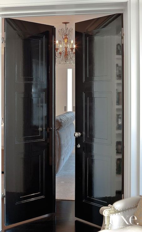 Master Bedroom Double Doors
 Black lacquered double doors open up to reveal a glimpse