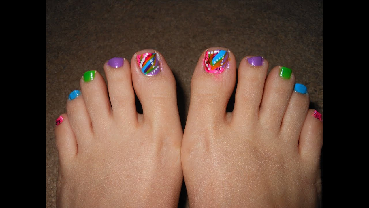 Toe Nail Design For Summer
 Multicolor abstract toe nails for Spring and Summer
