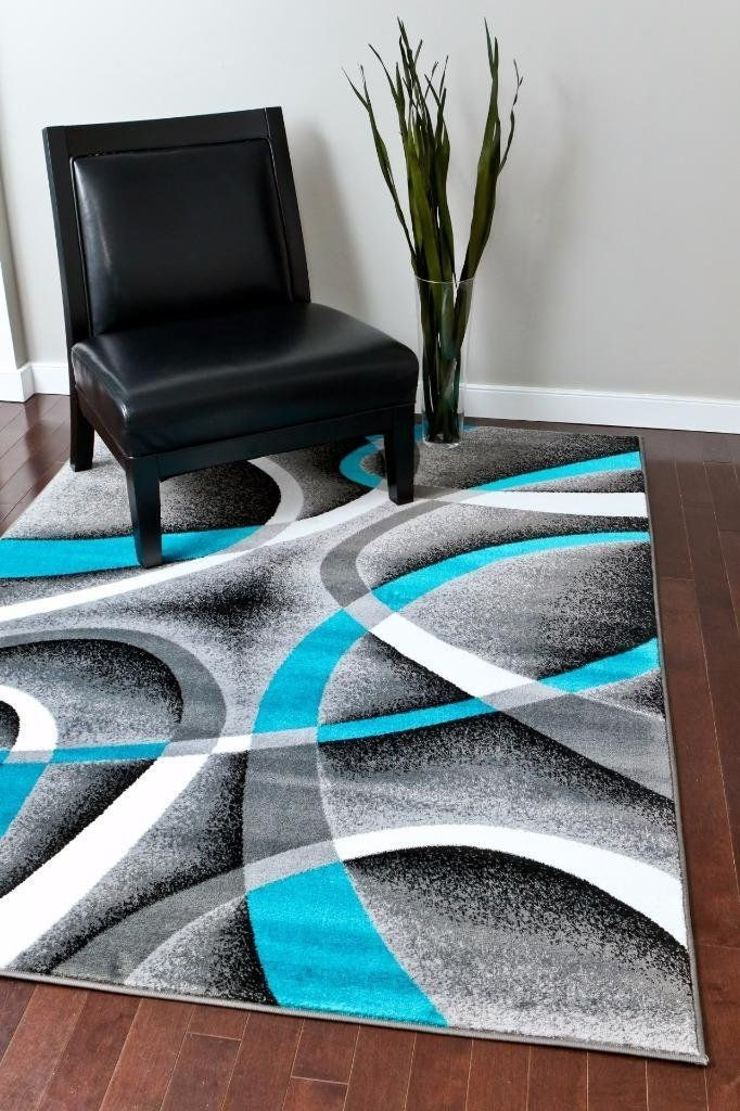 Turquoise Rug Living Room
 Beautiful posed stunning area rug that will immediately