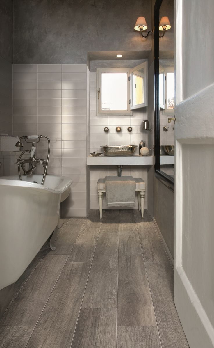 Wood Look Tile Bathrooms
 Wood Tile vs Real Wood Flooring – Interiors by Kelley Lively